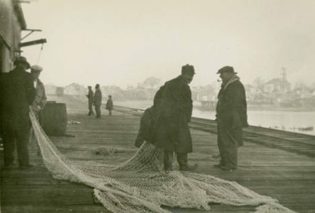 Rail Road Wharf with Fishermen