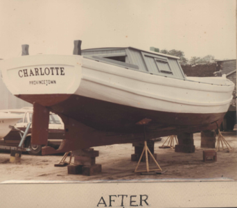 Color photo of trapboat Charlotte after restoration